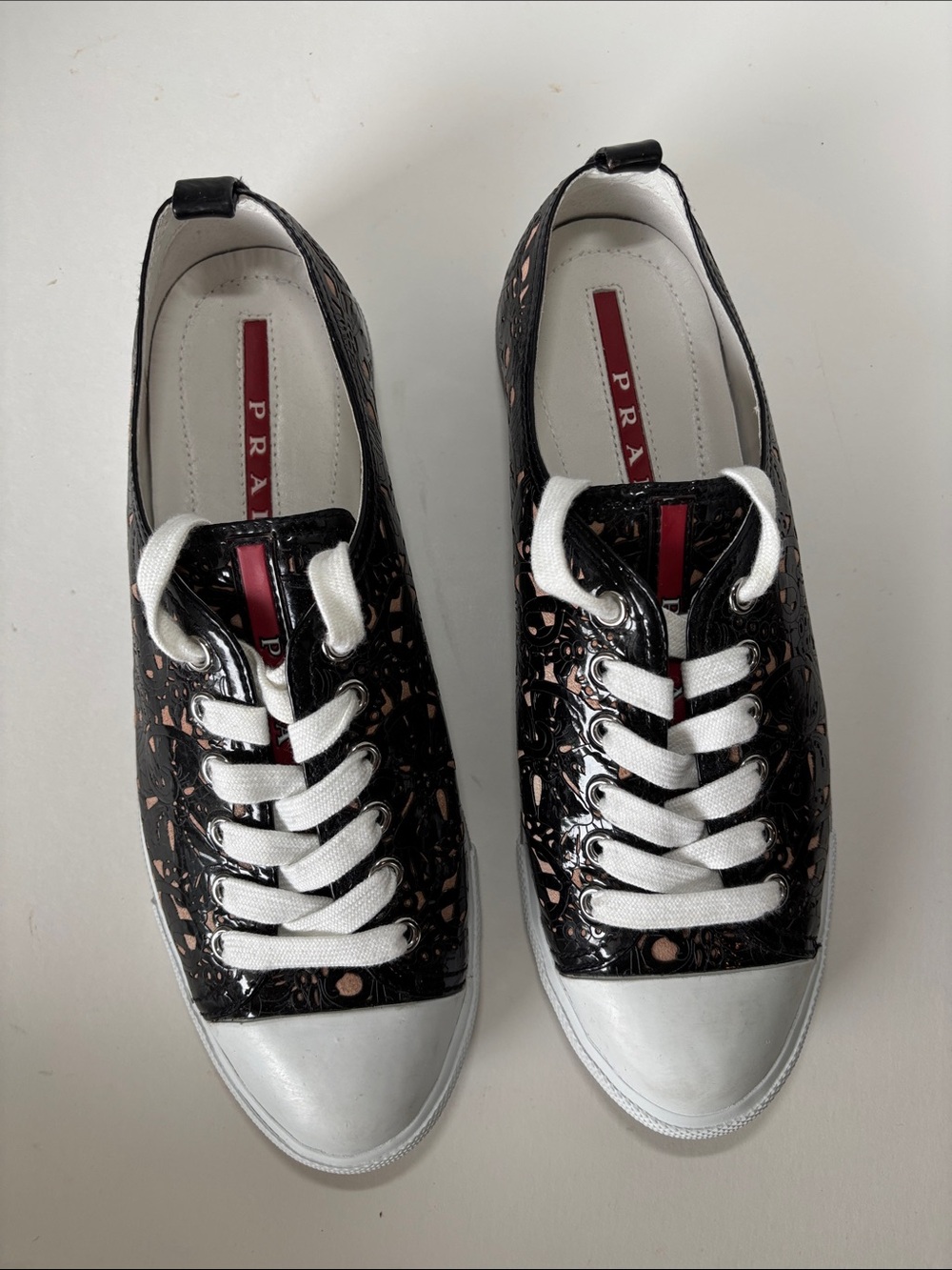 Prada Womens Black Leather Laser Cut Lace Up White Cap Toe Sneakers EU 37 US 7